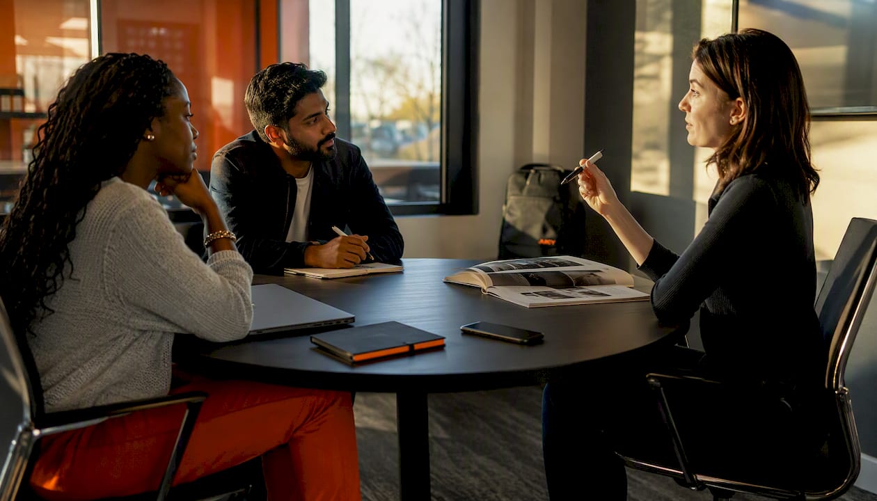 Team discussing Meta automotive ads strategy