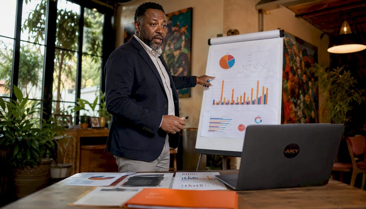 Marketer explaining organic reach decline in office