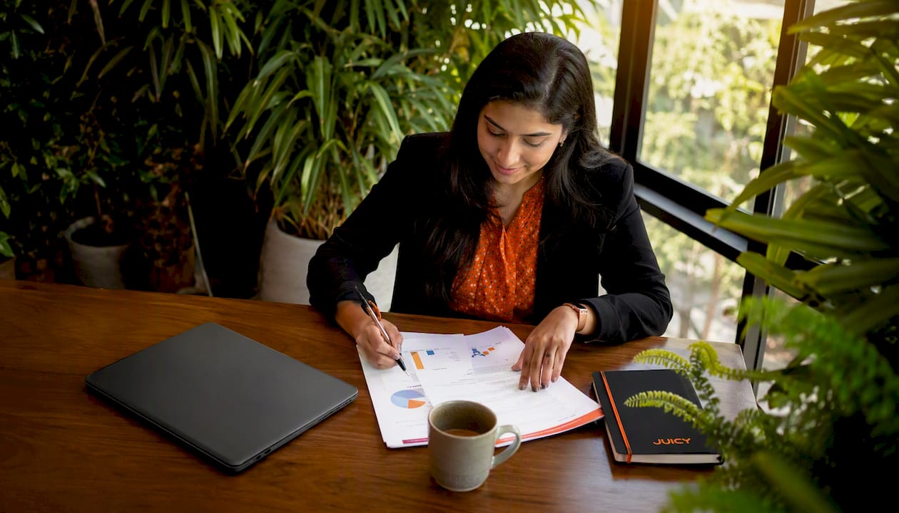 Businesswoman analysing user-generated content marketing results